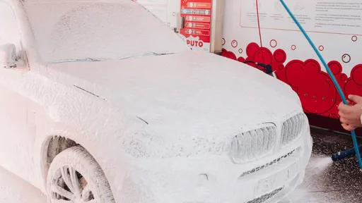 Car covered in foam at PUTO self-service car wash.