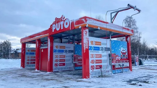PUTO self-service car wash in Brocēni with a snowy landscape and winter washing programs.
